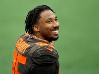Cleveland Browns defensive end Myles Garrett (95) of Arlington smiles to his family after their win against the Dallas Cowboys at AT&T Stadium in Arlington, Texas, Sunday, October 4, 2020. The Cowboys lost, 48-39. (Tom Fox/The Dallas Morning News) 