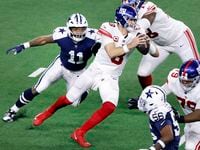 Dallas Cowboys linebacker Micah Parsons (11) chases New York Giants quarterback Daniel Jones...