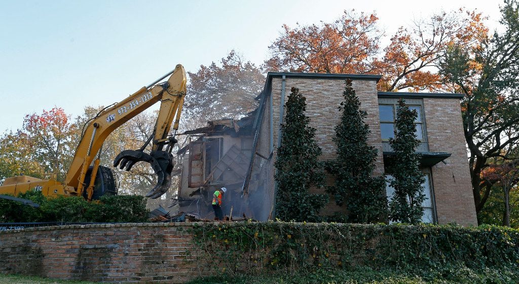 Demo crews got their teardown permit Tuesday morning. By Tuesday evening this is what the Penson House looked like in Highland Park.