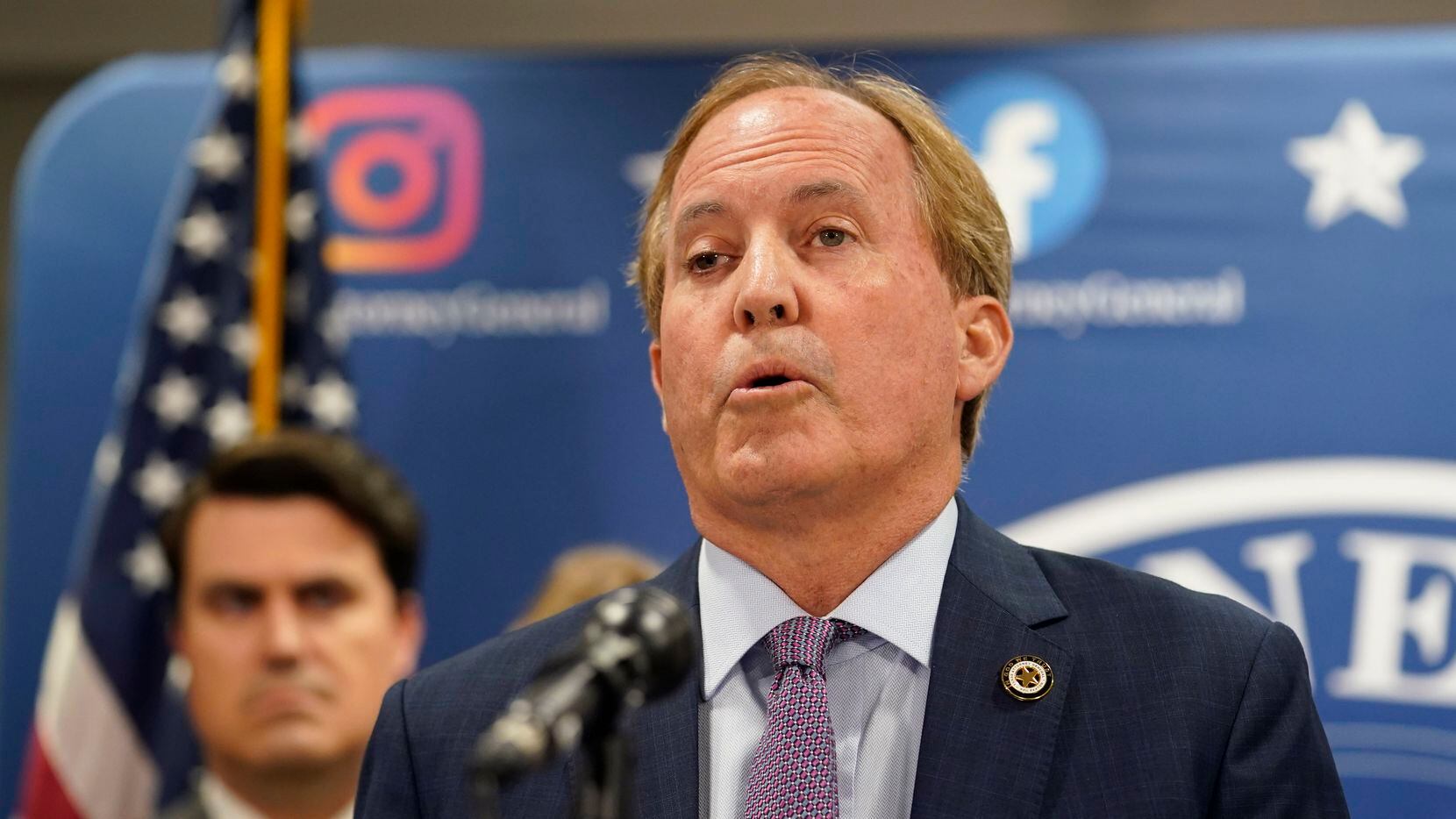 Texas Attorney General Ken Paxton makes a statement at his office in Austin, Texas, Friday,...