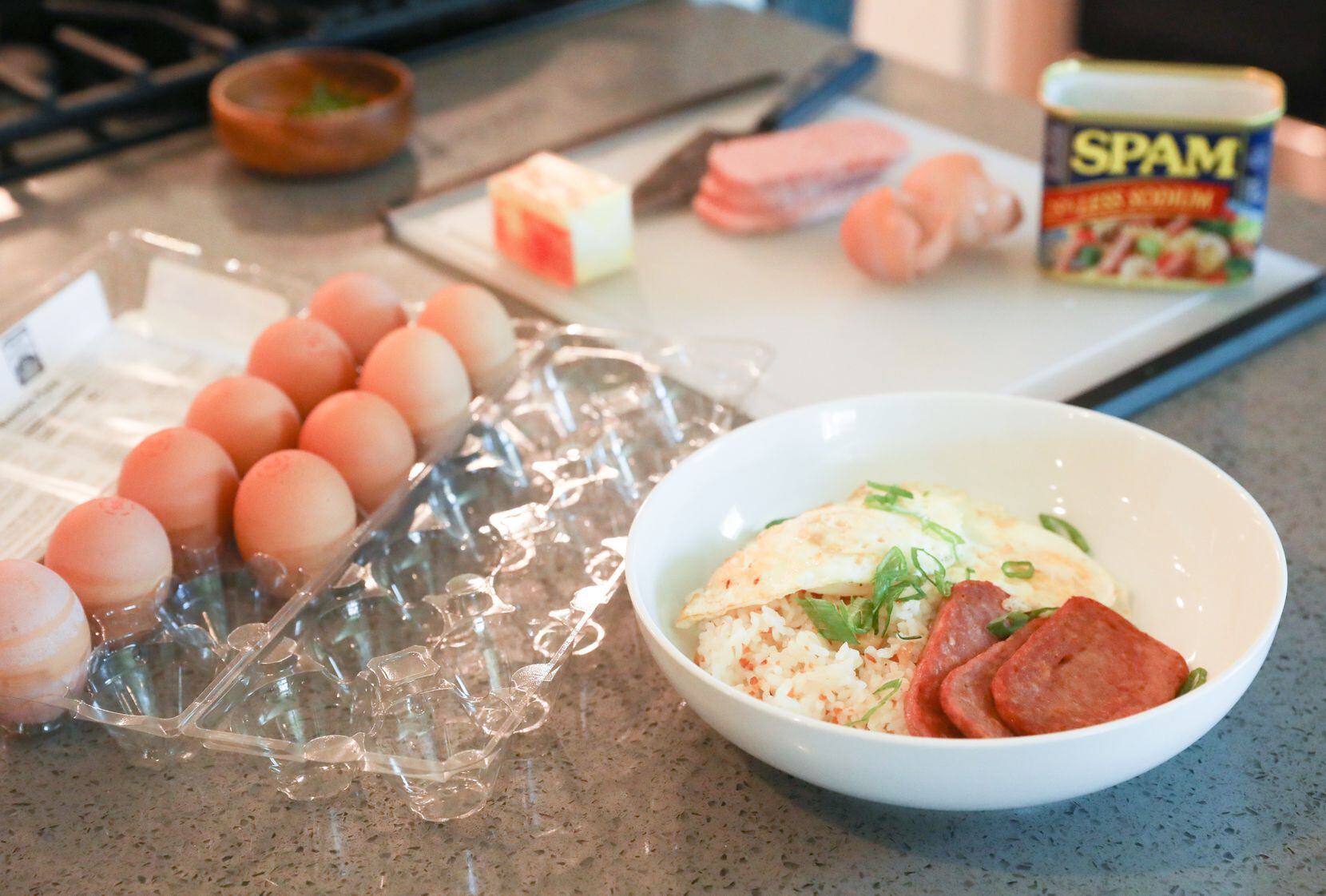 A serving of Spamsilog, a breakfast dish made with Spam, garlic fried rice and fried eggs,...
