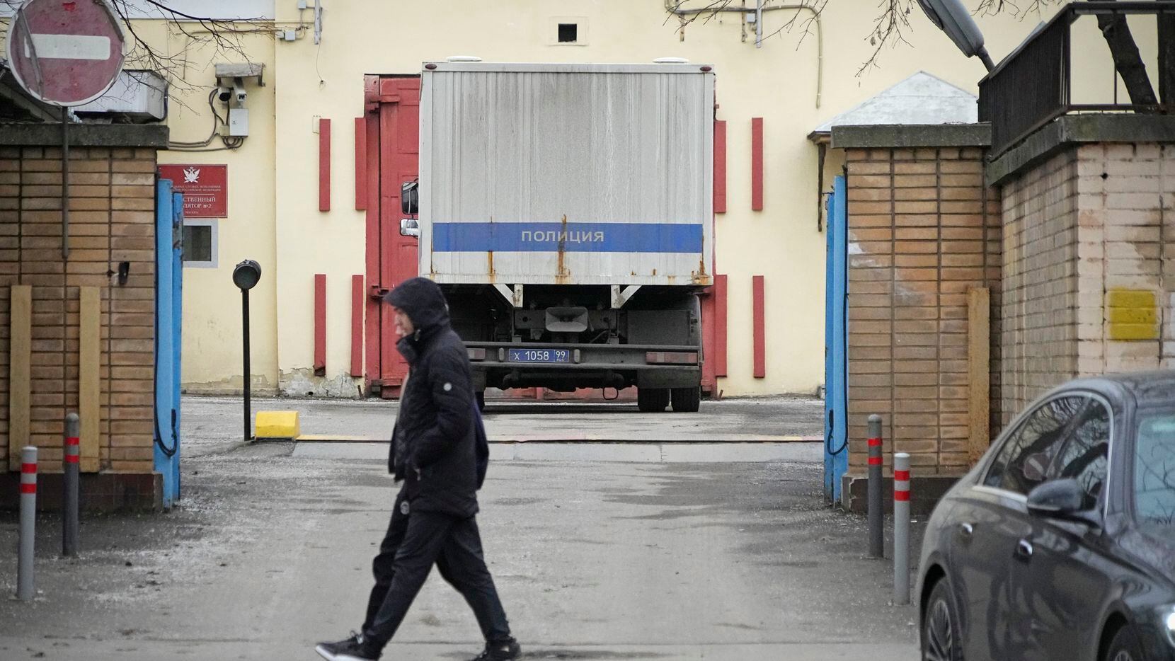 A man walks past an entrance of the Lefortovo prison, in Moscow, Russia, Thursday, March 30,...