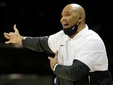 Duncanville head coach David Peavy responds to a decision made by a game official during...