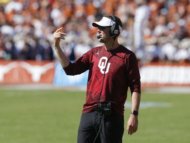 Oklahoma head coach Lincoln Riley signals to his team during the second half of an NCAA college football game against Texas at the Cotton Bowl in Fair Park, Saturday, October 9, 2021. Oklahoma won 55-48.