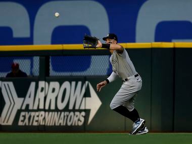 New York Yankees right fielder Aaron Judge (99) makes a catch for an out during the second...