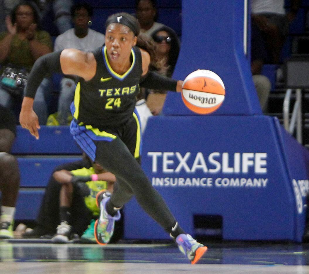 Dallas Wings guard Arike Ogunbowale (24) looks to set up an offensive play during first half...
