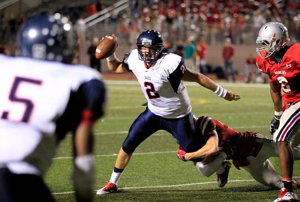 Allen QB Alec Morris (2) looks to throw a pass under pressure to RB Jonathan Williams (5)...