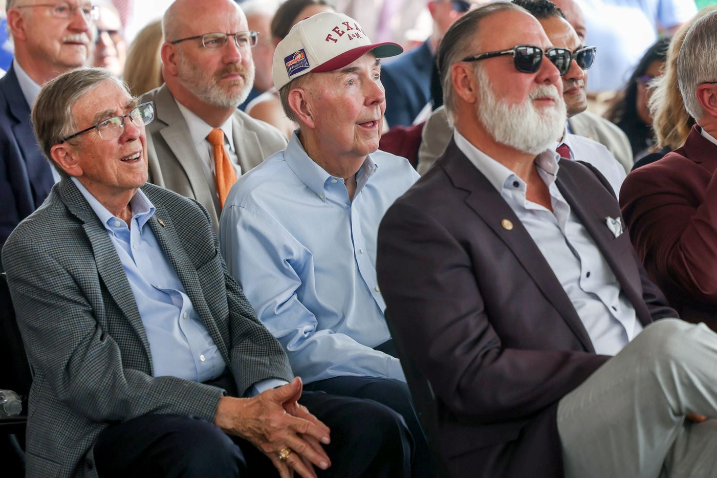 Dwain Mayfield (left), a ’59 and ’61 Texas A&M University graduate, and Erle Nye (center), a...