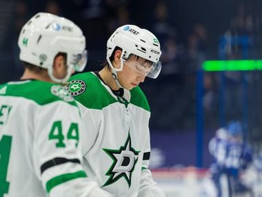 TAMPA, FL - MAY 5: Joel Hanley #44 and Jason Robertson #21 of the Dallas Stars react to the loss against the Tampa Bay Lightning during the third period at Amalie Arena on May 5, 2021 in Tampa, Florida.