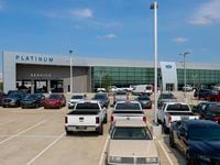 Pre-owned vehicles sit in a lot at Platinum Ford in Terrell, Texas Monday, May 16, 2022.