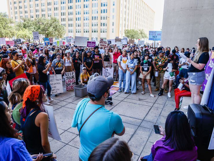 Abortion rights supporters gather at the Dallas City Hall in downtown Dallas on Wednesday,...