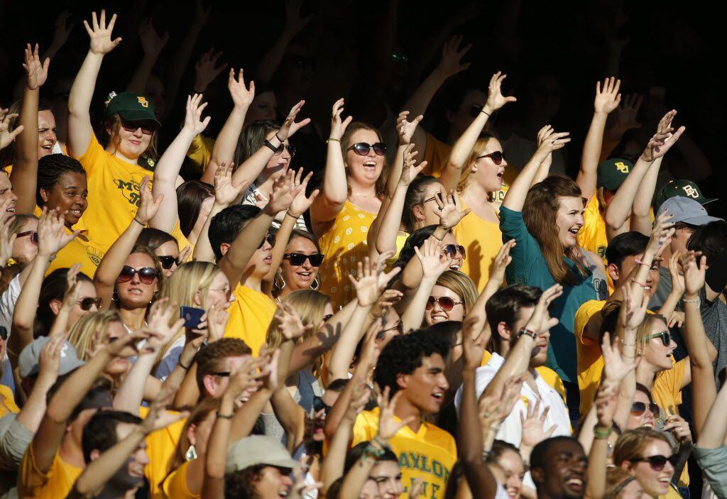 Baylor students do the "Bear Claw" in the stands during the Northwestern State University...