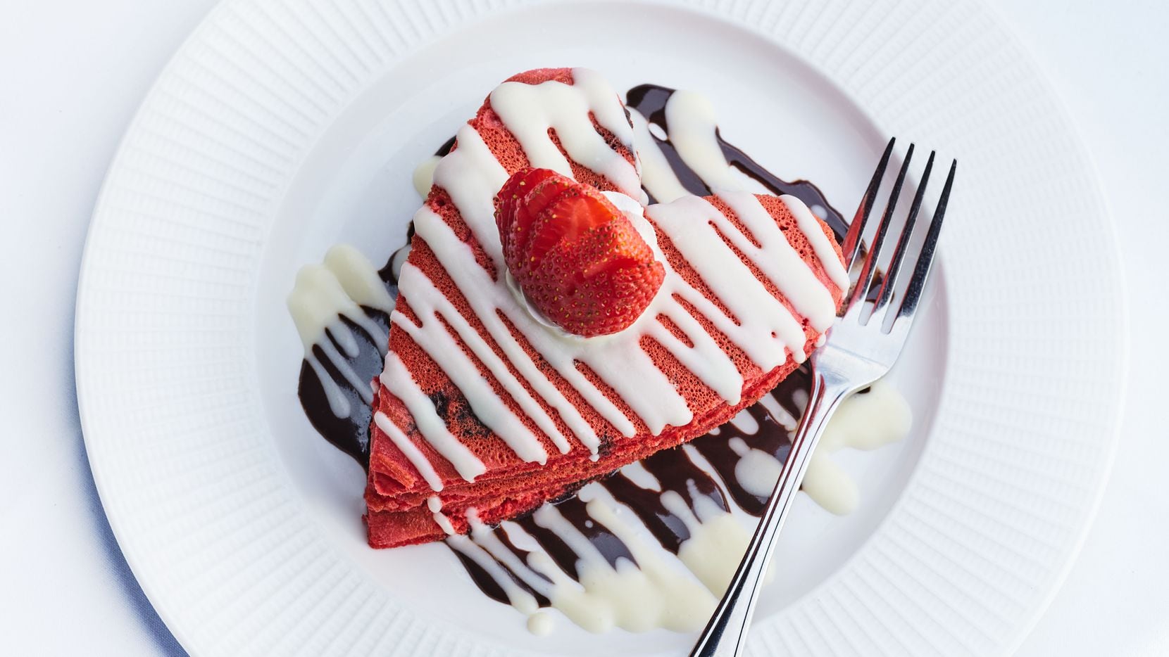 Al Biernat's offers red velvet heart shaped pancakes as part of its Valentine's Day...