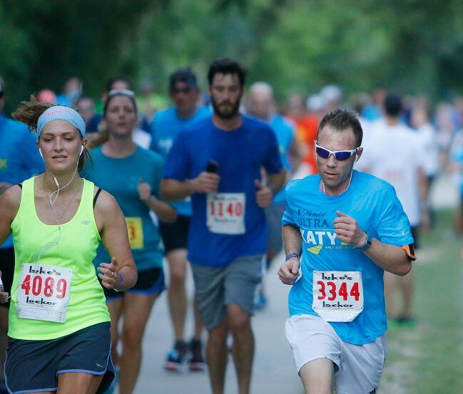 Runners compete in the Michelob Ultra Katy 5K.