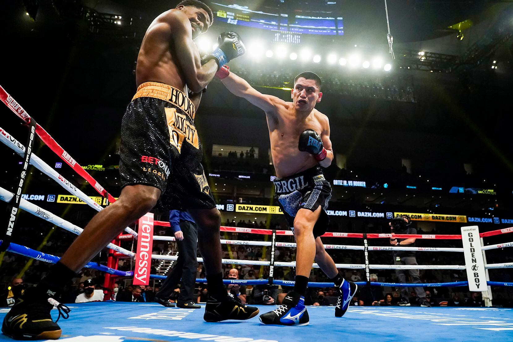 Vergil Ortiz Jr. (left) lands a punch on Maurice Hooker as they fight for the vacant WBO international welterweight title at Dickies Arena on Saturday, March 20, 2021, in Fort Worth.