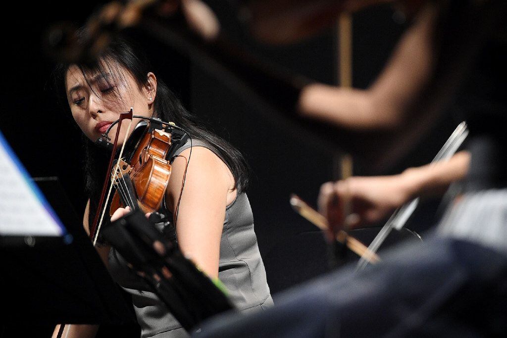 Violinist Ying Xue performs Steve Reich's "Different Trains" with the Parker Quartet at...