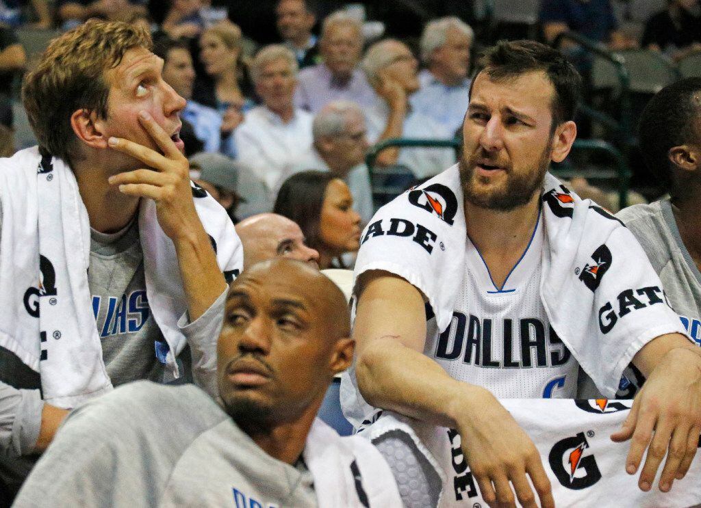 Dallas Mavericks forward Dirk Nowitzki (41) and center Andrew Bogut (6) sit on the bench in...