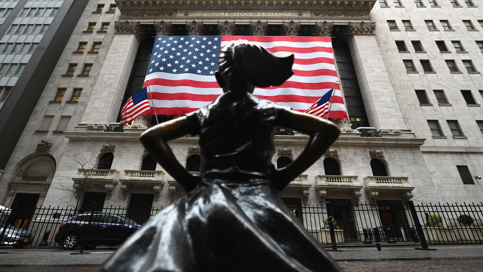 The Fearless Girl statue stands in front of the New York Stock Exchange near Wall Street.