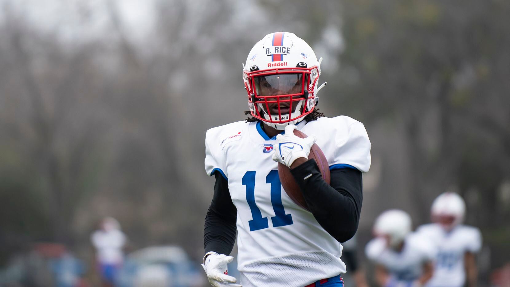 SMU senior Rashee Rice (11) catches a pass during football practice at Gerald J. Ford...