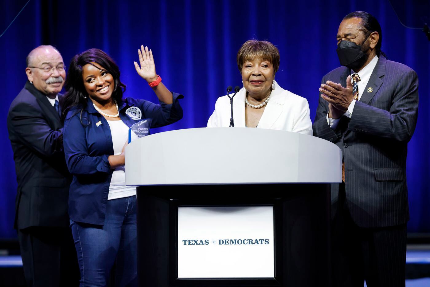 Outgoing U.S. Representative Eddie Bernice Johnson of Dallas (second from right) recognizes...