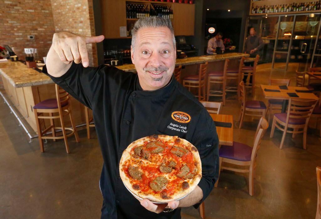 Chef Angelo Landi shows off his favorite Personal Pie pizza, the Spicey Meatball, offered...