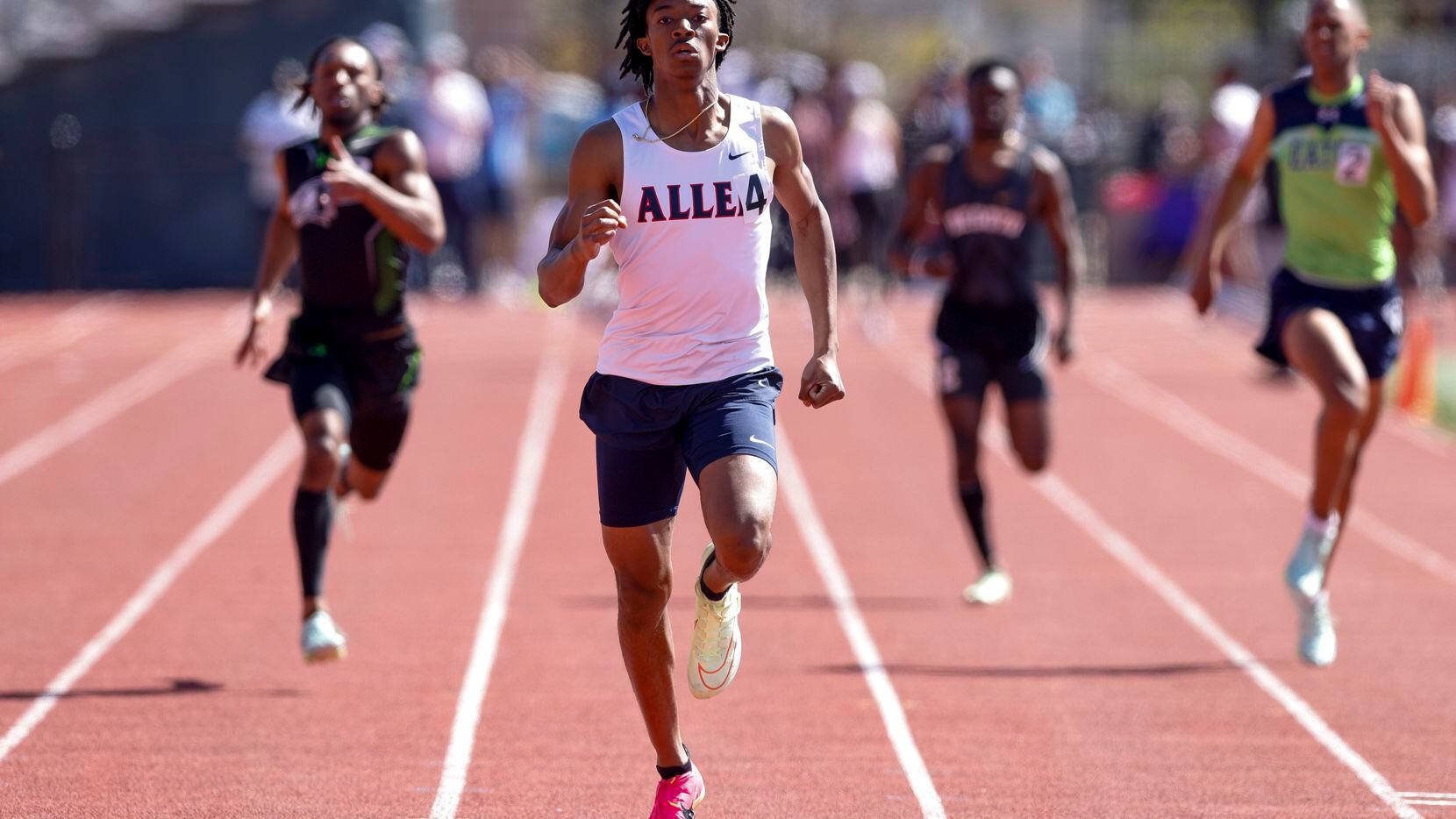 Allen’s Jonathan Simms wins the 6A 400 meter dash during the Jesuit-Sheaner Relays at Jesuit...