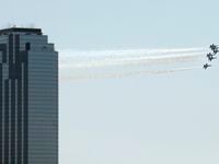 Jets fly past the Bank of America building in downtown Dallas in 2020.