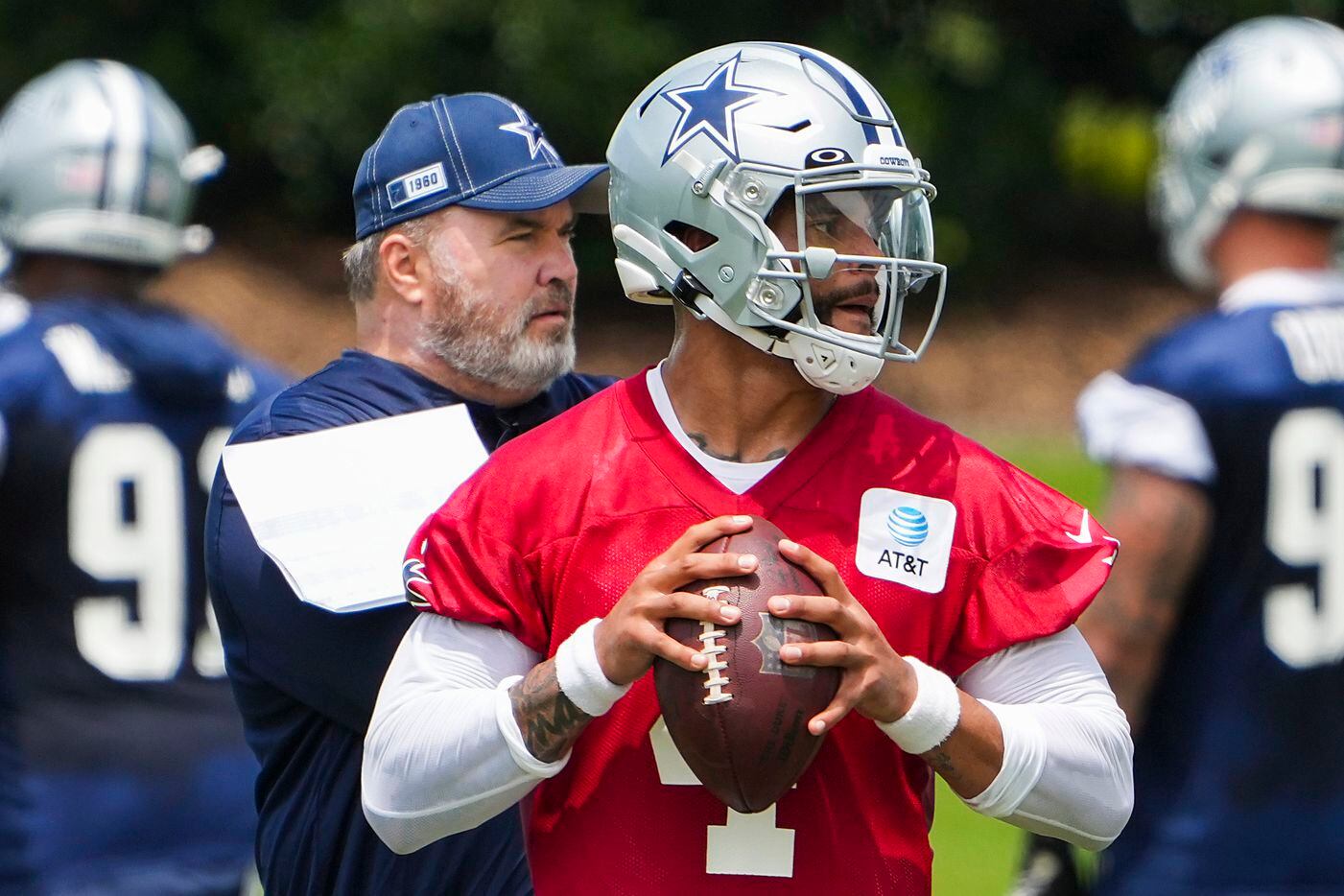 Dallas Cowboys head coach Mike McCarthy watches quarterback Dak Prescott (4) run a drill during a minicamp practice at The Star on Tuesday, June 8, 2021, in Frisco. (Smiley N. Pool/The Dallas Morning News)