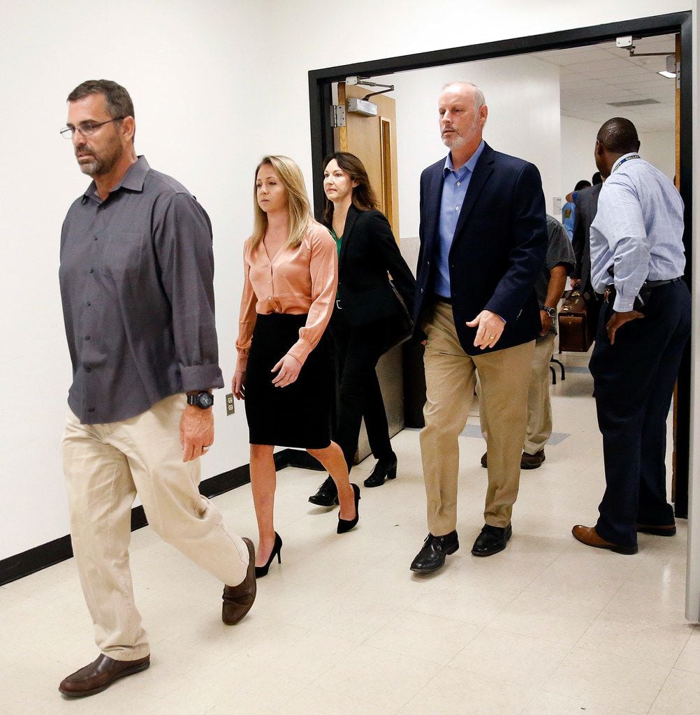 Along with her team, fired Dallas police Officer Amber Guyger (second from left) arrived for...