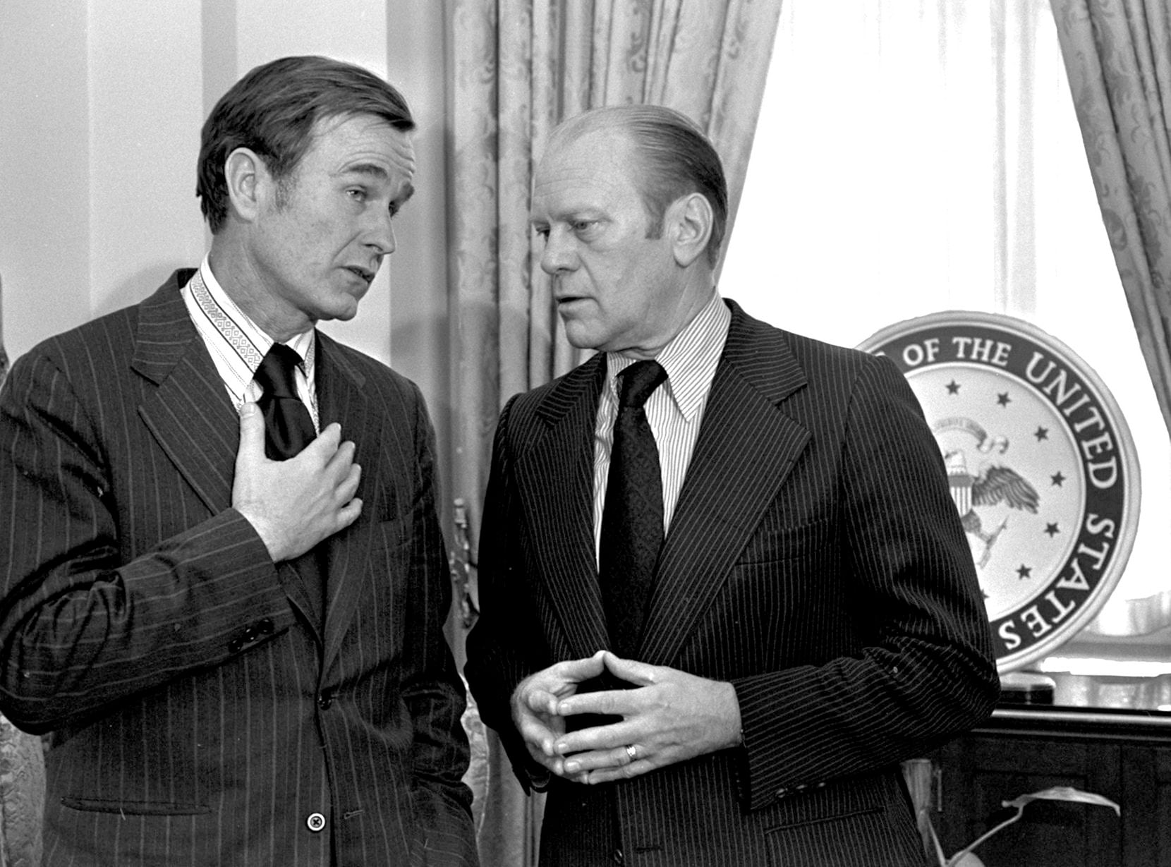 Republican National Chairman George H.W. Bush (left) chats with Vice President Gerald Ford...
