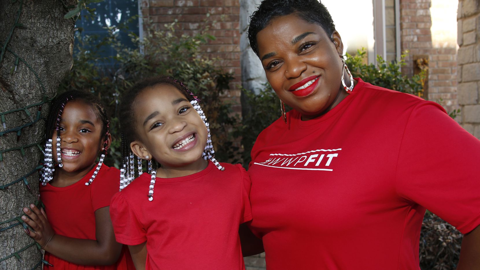 United States Army veteran LaNeika Johnson, shown with her 5-year-old daughters Laiya, left,...