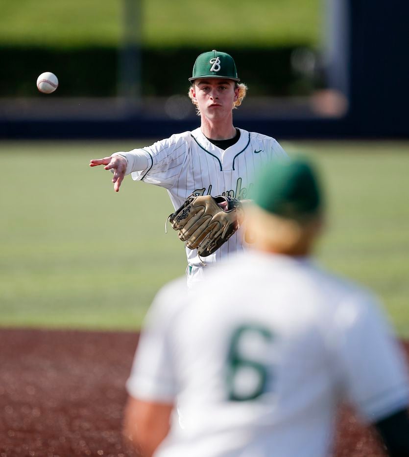 Birdville’s Alex Showalter (8) throws to first baseman Bynum Martinez (6) to force out Mansfield Legacy’s Hayden Guerin (17) during the second inning of a high school Class 5A Region I quarterfinal series at Dallas Baptist University, Thursday, May 20, 2021. (Brandon Wade/Special Contributor)