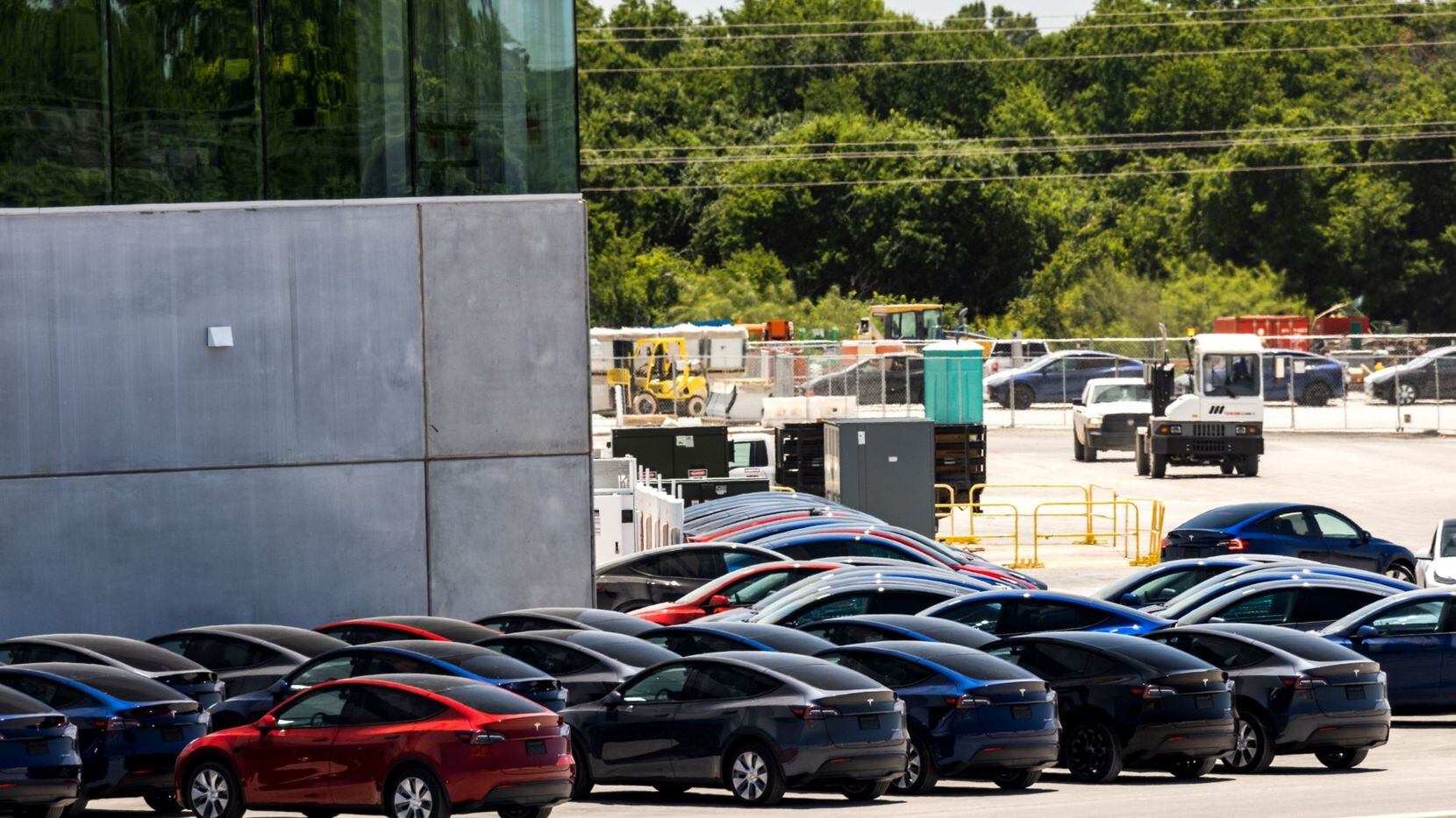 Electric vehicles parked outside the Tesla Gigafactory in Austin, Texas, US, on June 23, 2022.
