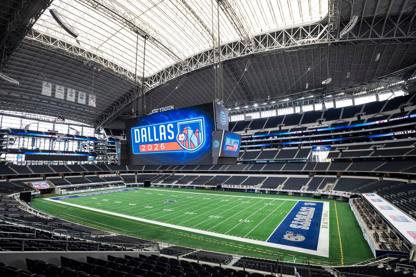 Dallas 2026 candidate host city logos are on display on the giant video board at AT&T...