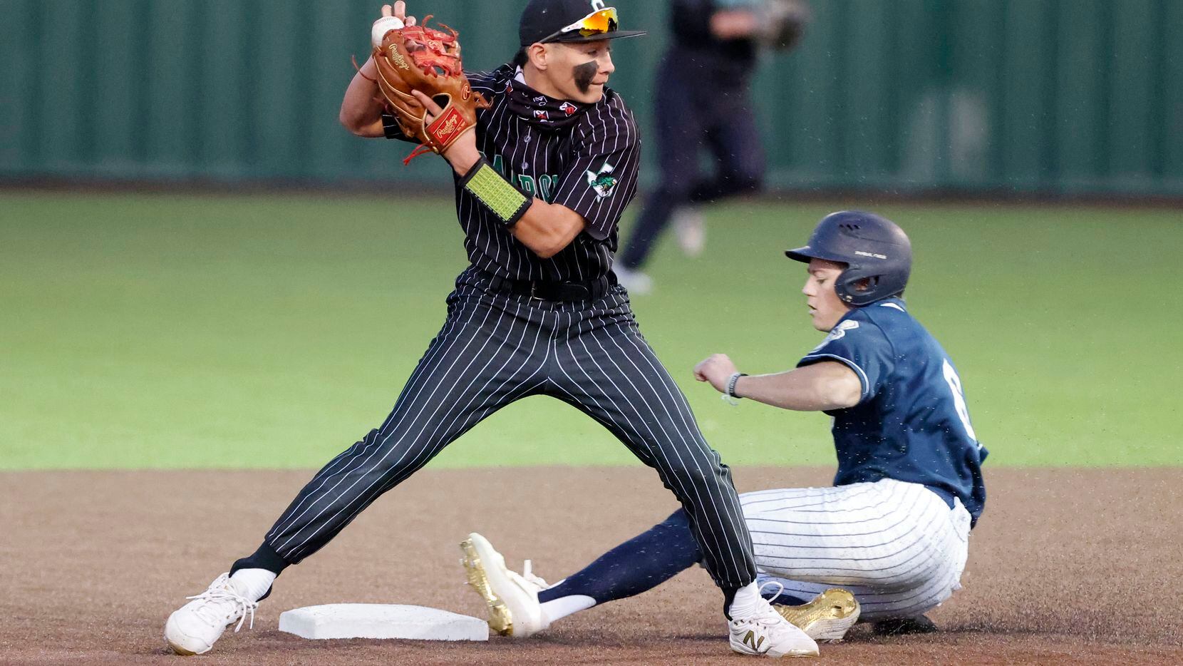 Southlake’s Ethan Mendoza forces out Keller’s Griffin Barton (6) during the fourth inning of their Class District 4-6A baseball game in Souhtlake, Texas on March 19, 2021. (Michael Ainsworth/Special Contributor)