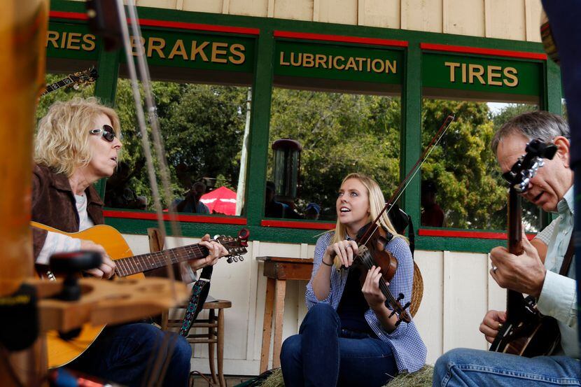 Musicians jam during the Bloomin' Bluegrass Festival at Farmers Branch Historical Park.