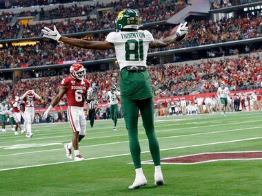 Baylor Bears wide receiver Tyquan Thornton (81) celebrates his second quarter touchdown against the Oklahoma Sooners in the Big 12 Championship at AT&T Stadium in Arlington, Saturday, December 7, 2019.