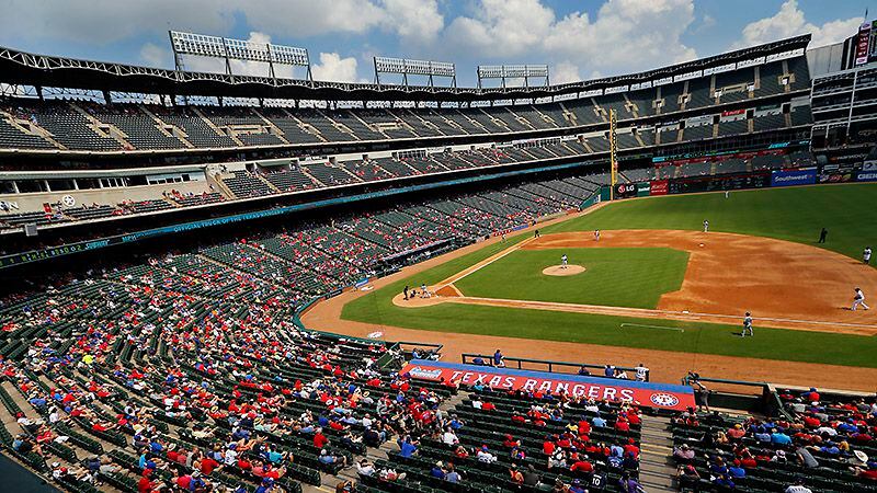 A smattering of fans turned out to watch the first-place Texas Rangers play an afternoon...