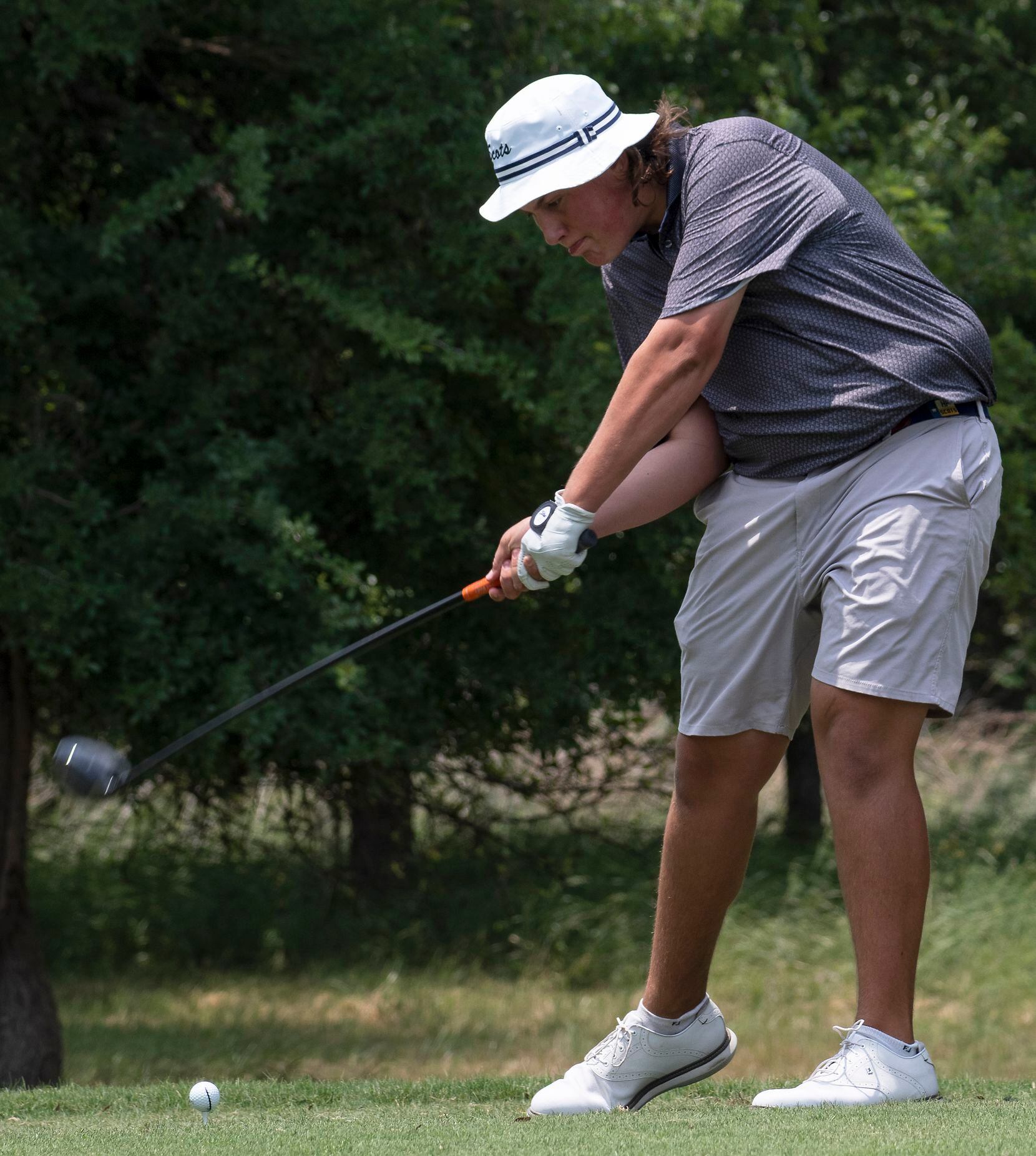 Highland Park, Brooks Simmons, tees off on the no. 15 hole during the first round of UIL...