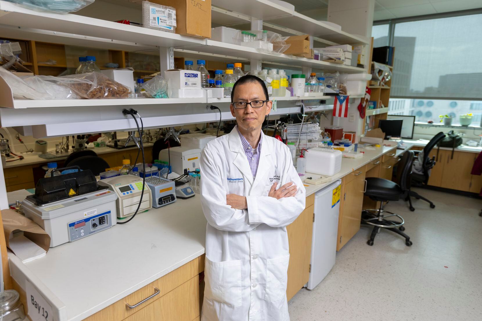 UT Southwestern pediatric neurologist Dr. Peter Tsai poses for a photo in his lab in Dallas,...