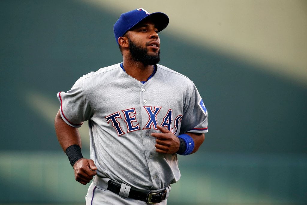 Texas Rangers' Elvis Andrus warms up before a baseball game against the Baltimore Orioles in...