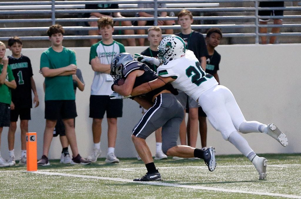 Denton Guyer's Seth Meador (19) catches a pass for a touchdown in front of Southlake...