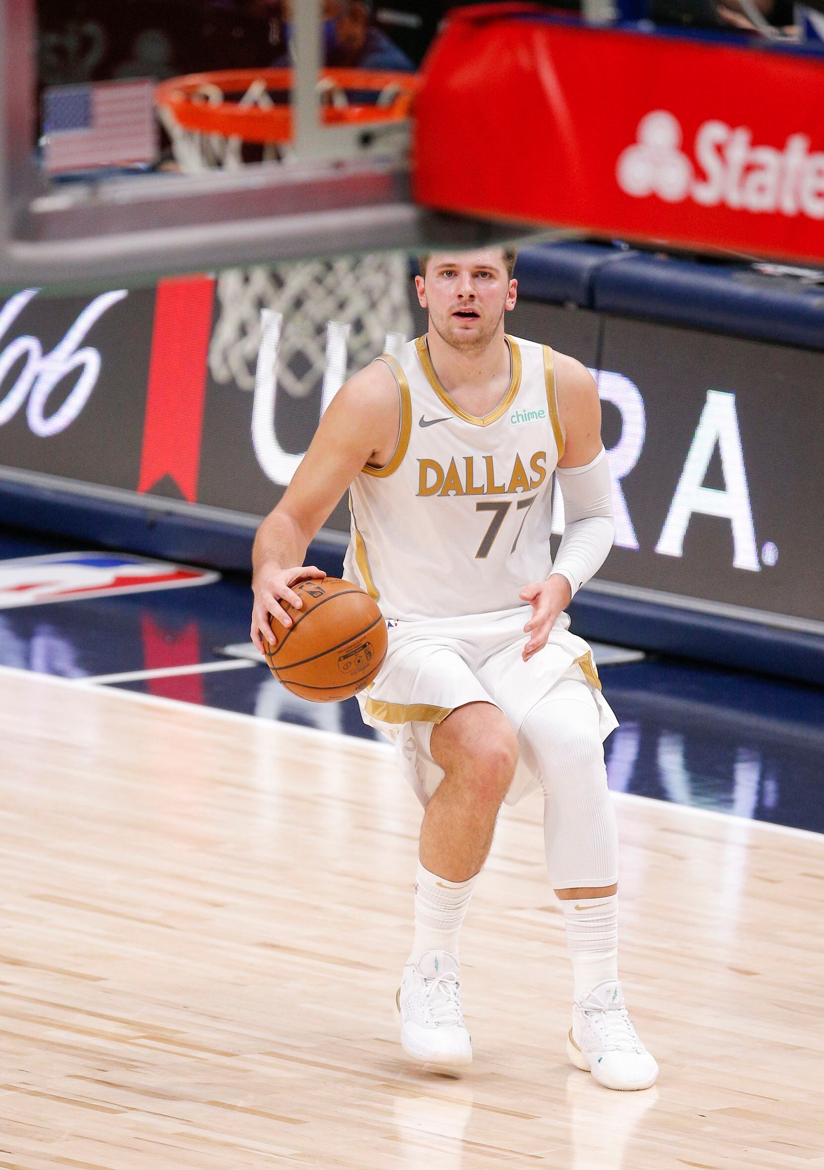 Dallas Mavericks guard Luka Doncic (77) looks to take a shot during the first half of an NBA...