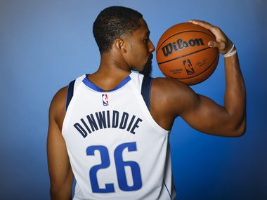 Dallas Mavericks’ Spencer Dinwiddie is photographed during the media day at American...