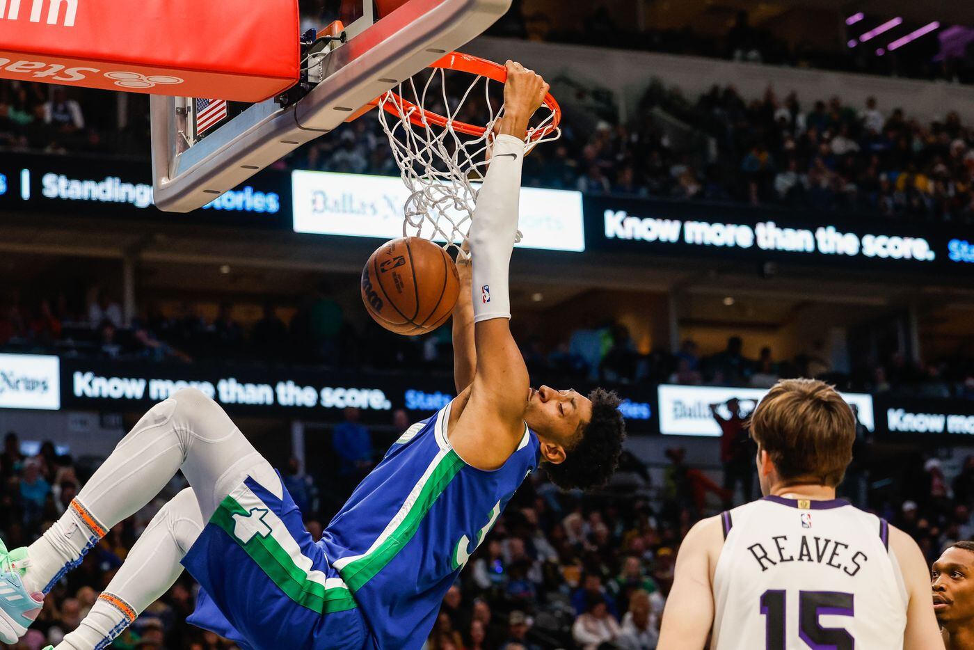 Dallas Mavericks forward Christian Wood (35) ducks the basketball next to Los Angeles Lakers...