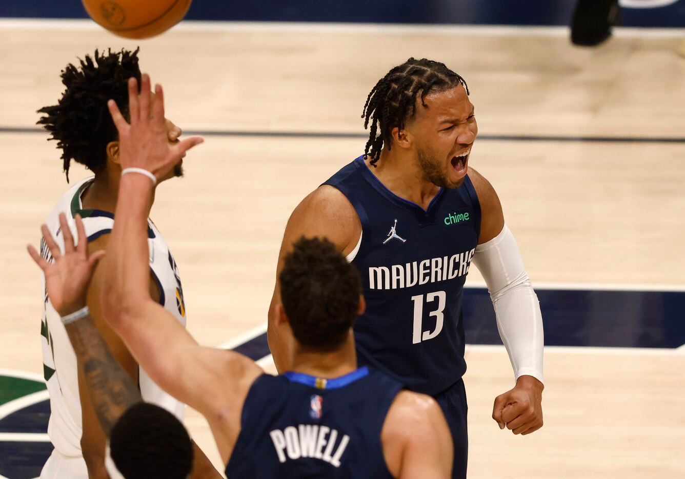 Dallas Mavericks guard Jalen Brunson (13) celebrates in front of Utah Jazz center Hassan...