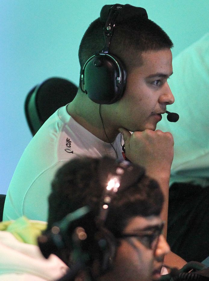 OpTic Texas player Anthony "Shotzzy" Cuevas watches his screen during the first match...