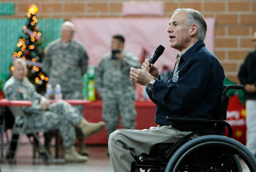 Texas Gov. Greg Abbott addresses members of the Texas National Guard, who are deployed on...
