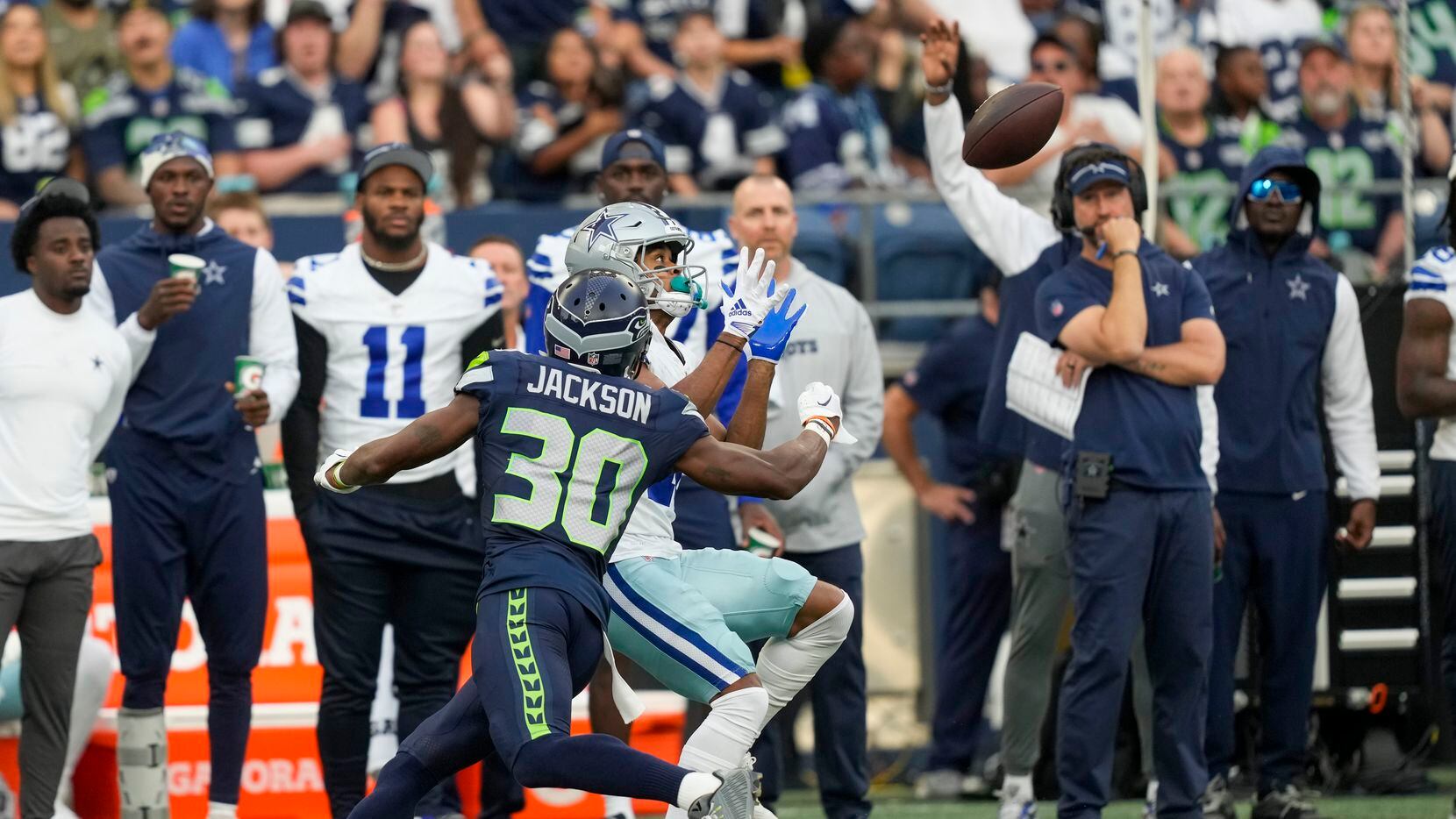 Dallas Cowboys wide receiver Jalen Tolbert catches a pass in front of Seattle Seahawks...