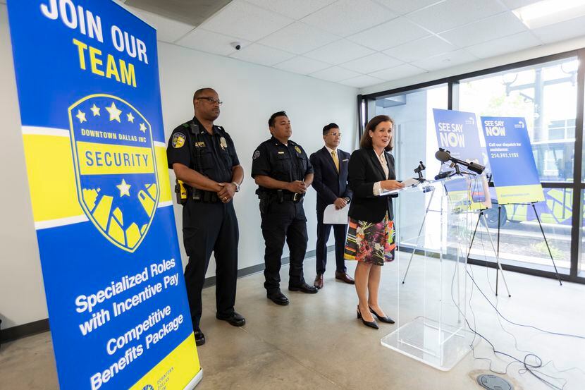 Jennifer Scripps, Downtown Dallas, Inc. president and CEO, leads a press conference to...
